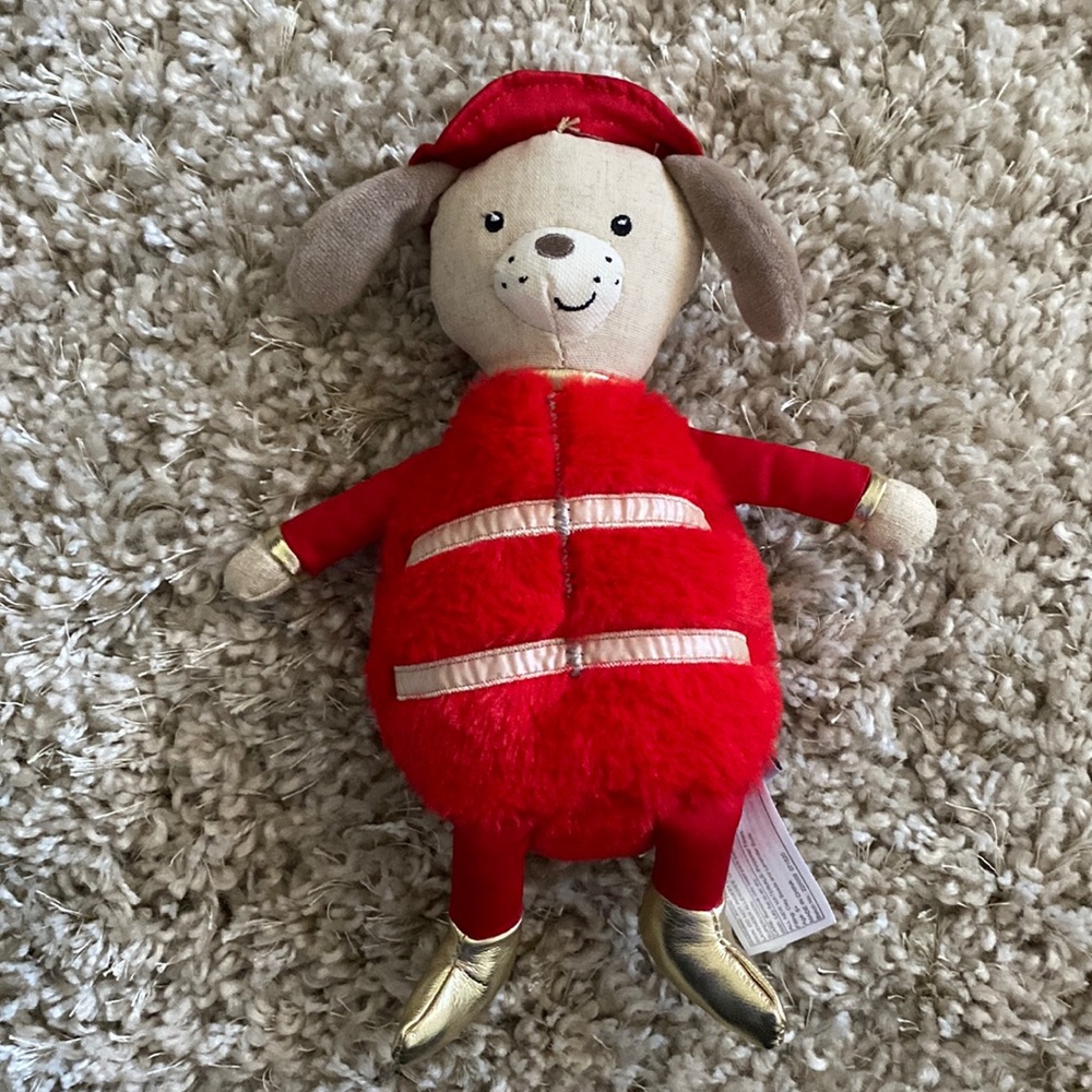 New without tags. Mon Ami Firedog. Removable bag to heat or cool.